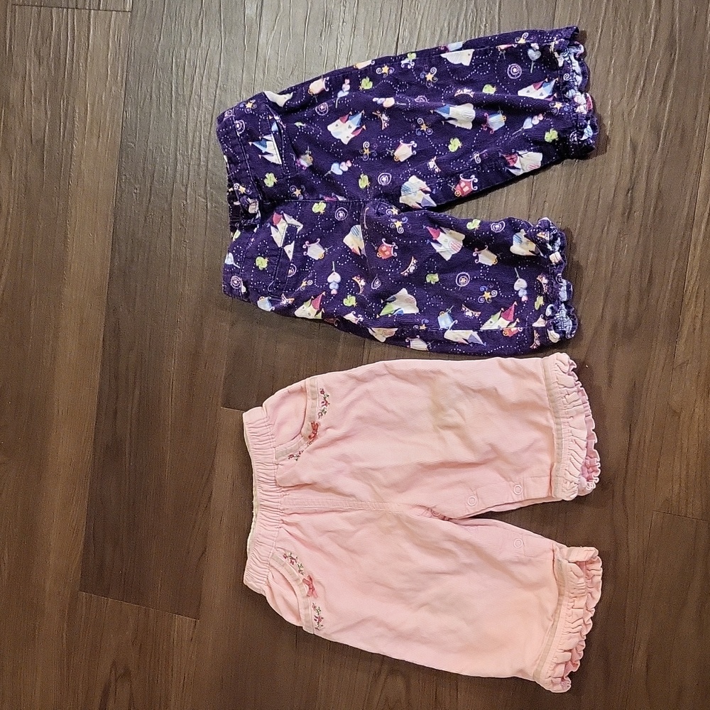 Two pairs of corduroy pants, size 12 months.